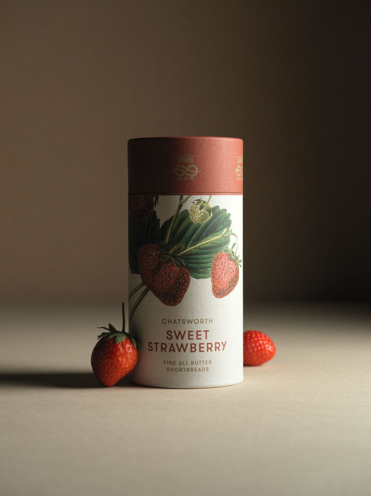 Strawberry Chatsworth Artisan Biscuits. Vertical packaging with botanical illustrations across the side.