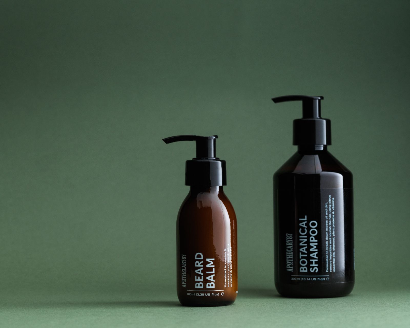 Two natural grooming products by Apothecary 87 Beard Balm, Botanical Shampoo. - branding and packaging design by 93ft Design. 