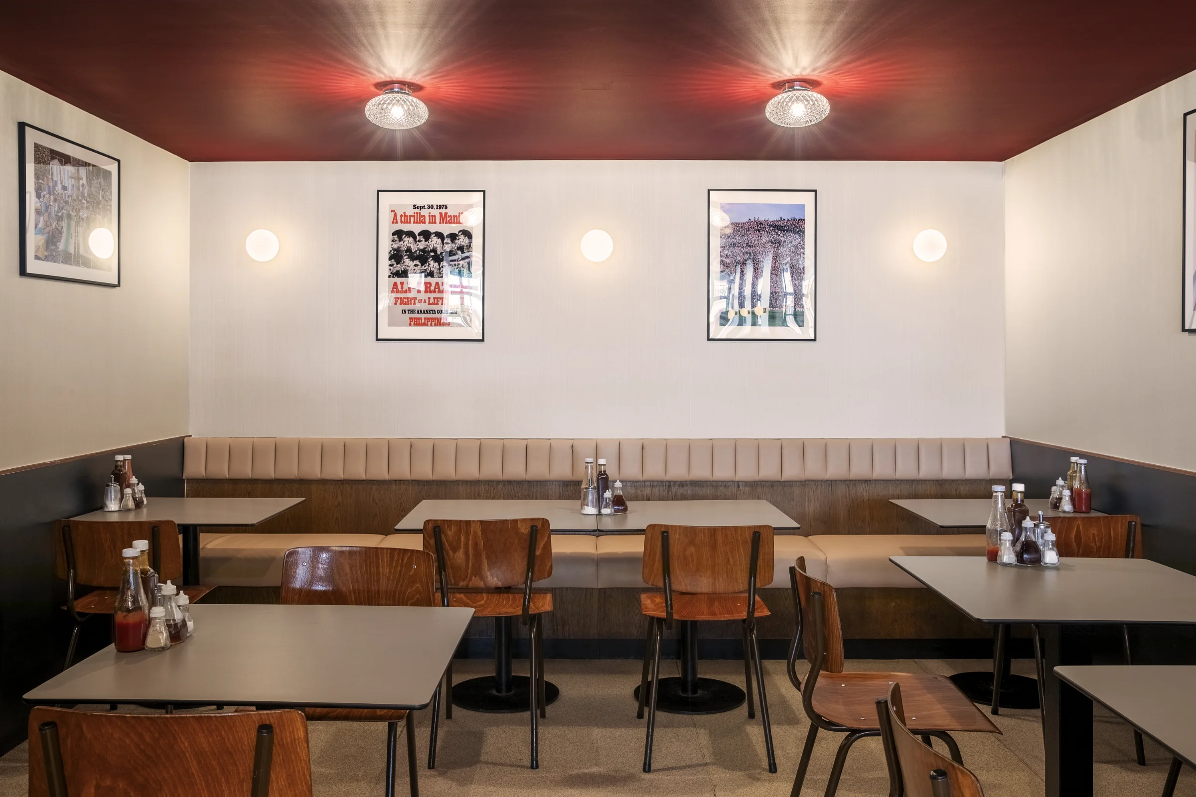 Interior cafe view, cosy lighting, table and chairs