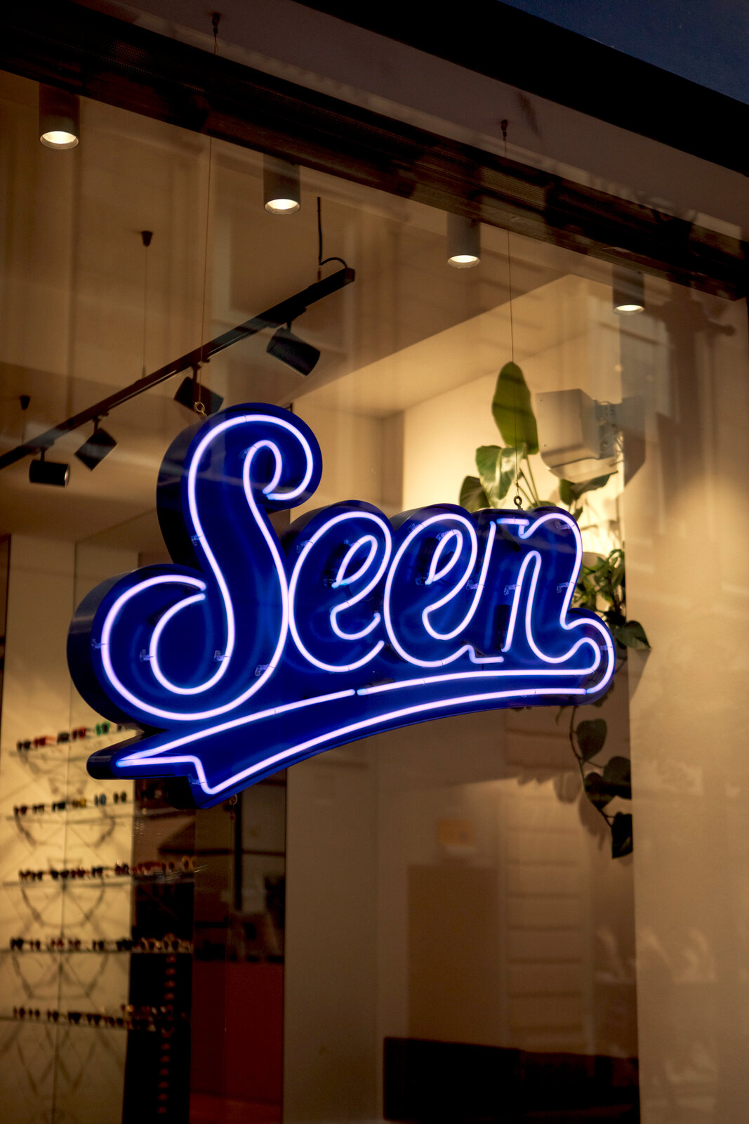 Seen Opticians - Creating a modern Manchester storefront featuring real neon signs and authentic hand painted sign writing