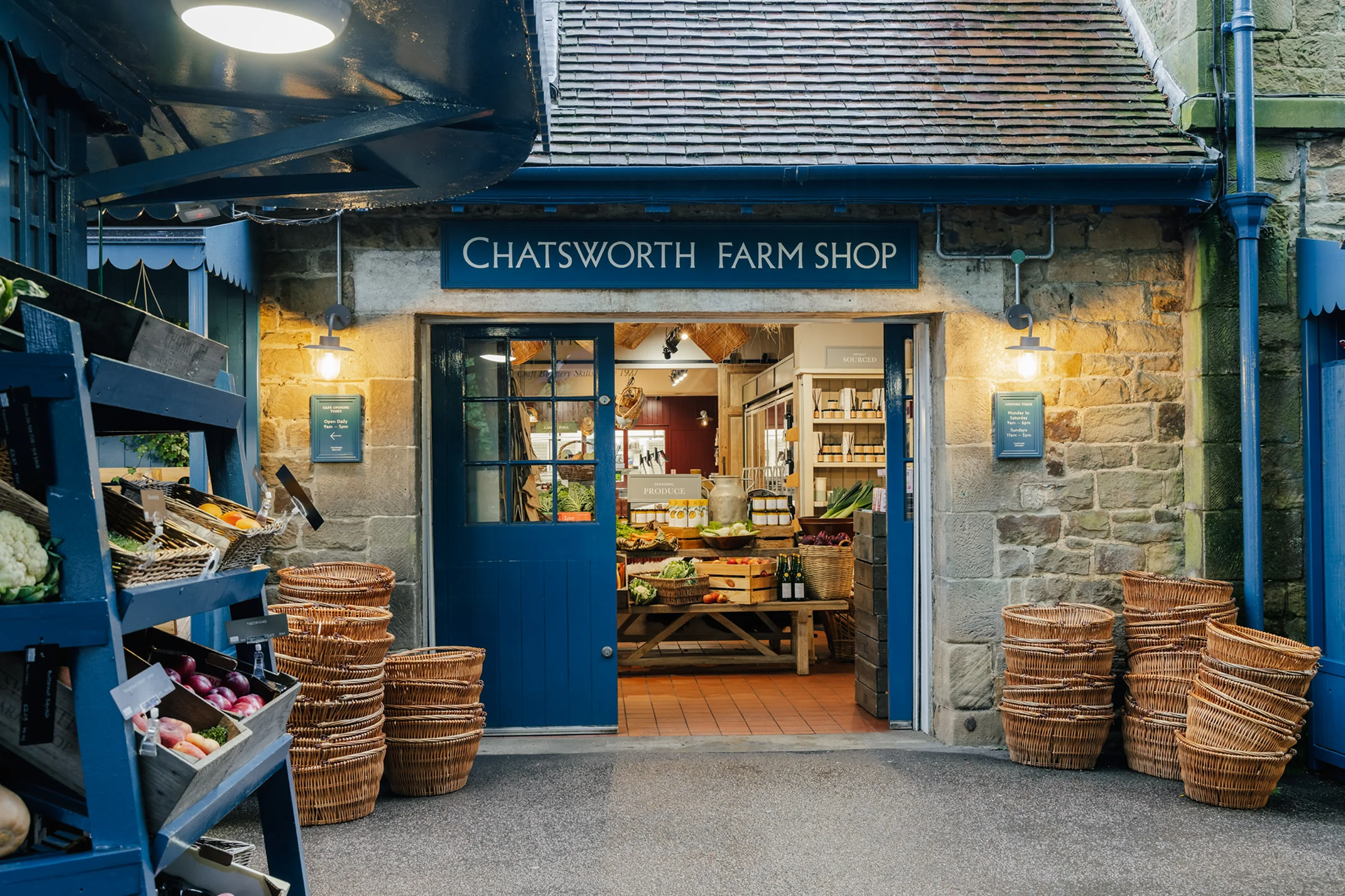 Main entrance exterior, wicker baskets and produce 