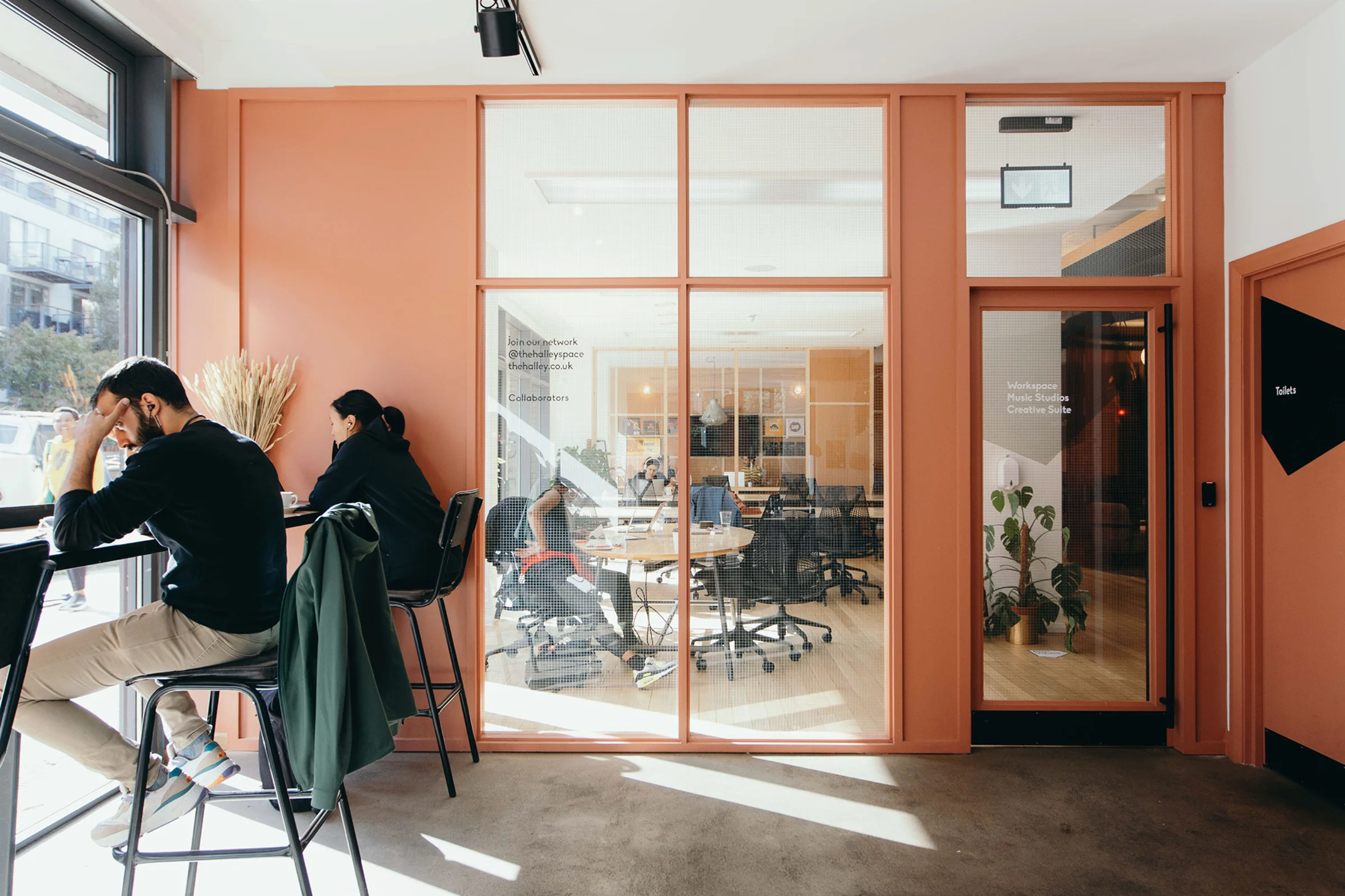 Wide-angle of lower floor bench and meeting room